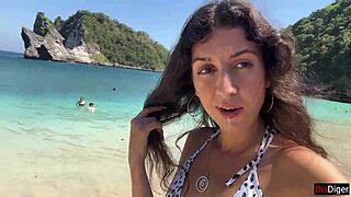 Brunette gets a messy facial on the beach