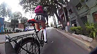 Cross dressing beauty in socks and miniskirt in the city