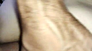 A husband watches his wife, a hot milf, dominate and satisfy her partner