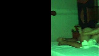 A housewife gets satisfied by two young men’s penises in a group sex scene