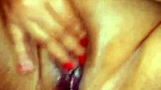 A beautiful woman with a chubby genitalia experiences a squirting orgasm