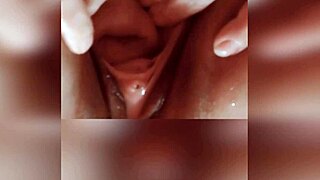 The girl's cunt was stretched not only by fingers but also by hands