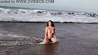 A hot step mom asked her boy to pose with her naked on the beach