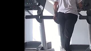A girl with big ass runs on the treadmill