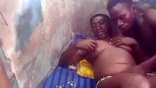 Fucking a black girl with massive breasts in a private setting
