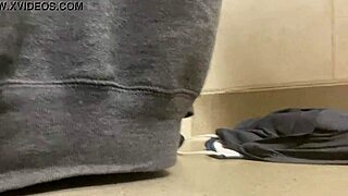 Black beauty gives a voyeuristic blowjob in the bathroom