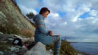 i tie sofi up against the sea while she reads a book in pov bondage