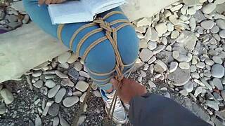 i tie sofi up against the sea while she reads a book in pov bondage