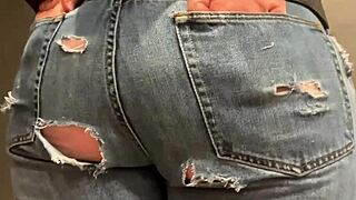 Jeans-clad girl's big butt gets grope in jeans
