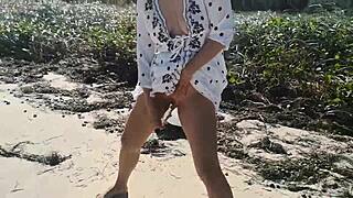 Outdoor Asian slut masturbates on the beach