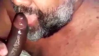 Young twink gives a satisfying black cock blowjob