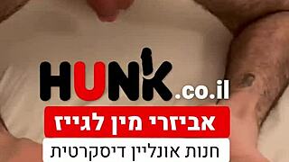 Young gay man engages in sex at a store in Tel Aviv