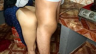 Indian bhabhi’s big ass bent over for a kitchen doggystyle pounding.