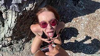 A beautiful couple enjoys hot sex on the beach with a stranger
