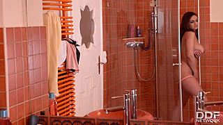 Beautiful Spanish woman with perfect body washes herself in the shower and masturbates
