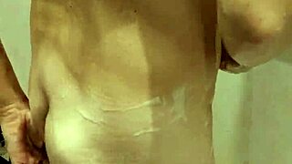 In a steamy bathroom scene, the curvy step sister notices the hidden gaze and teases with her wet body